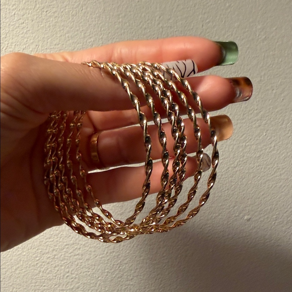 Set of gold tone bangles